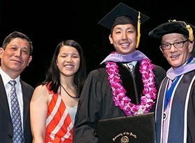Dr. Tran and his family at graduation